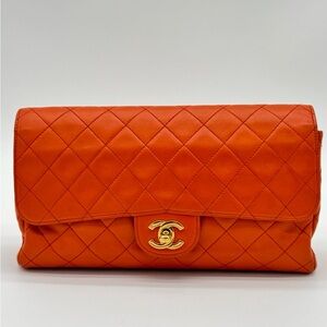 CHANEL Vibrant Orange Quilted Clutch